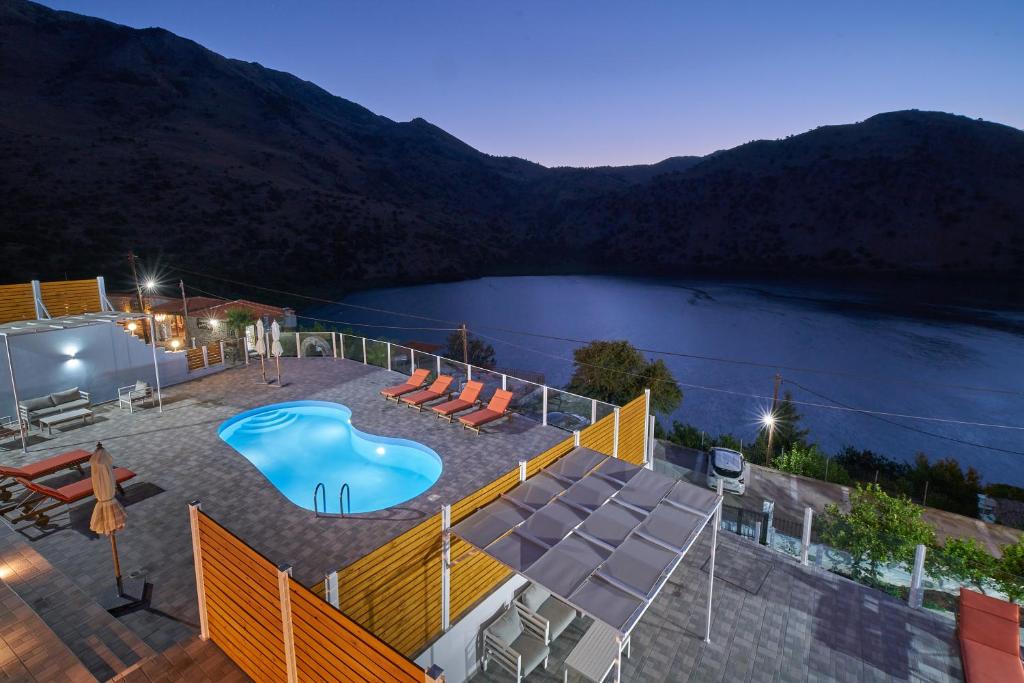 Suite 2 Lake View Luxury - private pool with Lake Kournas view at dusk